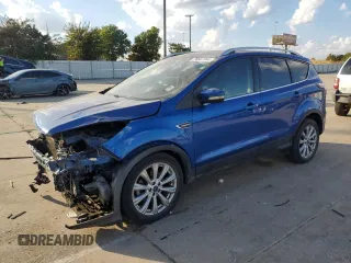 2017 Ford Escape Titanium with VIN 1FMCU0JD2HUB21261, listed as a Copart auction lot 76607264 with 130,796 mi miles and Salvage Title. Bid and sale history available at carsss.com. Image 1.