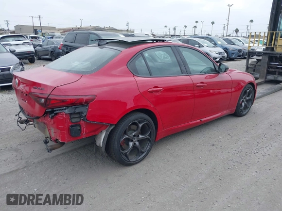 2019 Alfa Romeo Giulia Ti Sport with VIN ZARFAMBN0K7606969, listed as a IAAI auction lot 41962828 with 46,544 mi miles and . Bid and sale history available at DreamBid. Image 4.