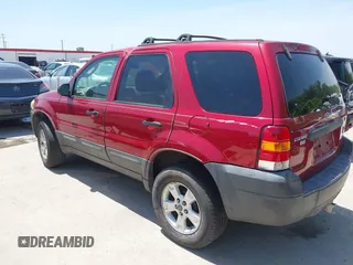 2005 Ford Escape XLT with VIN 1FMYU031X5KE17077, listed as a IAAI auction lot 42260075 with 234,758 mi miles and . Bid and sale history available at DreamBid. Image 3.