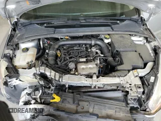 2018 Ford Focus SE z VIN 1FADP3FE9JL234158, wystawiony jako Copart lot #51788755 z przebiegiem 99 877 mil mil oraz Szkoda całkowita • Salvage title. Historia ofert i sprzedaży dostępna na DreamBid. Obrazek 12.