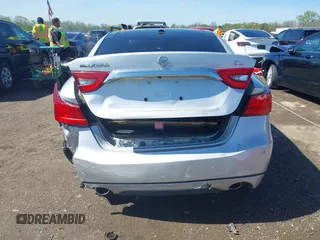 2018 Nissan Maxima SR with VIN 1N4AA6AP3JC374804, listed as a IAAI auction lot 42145406 with 136,757 mi miles. Bid and sale history available at carsss.com. Image 6.