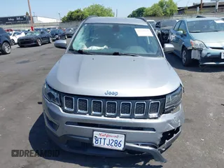 2018 Jeep Compass Latitude with VIN 3C4NJCBBXJT102753, listed as a IAAI auction lot 42379577 with 98,423 mi miles and . Bid and sale history available at DreamBid. Image 12.