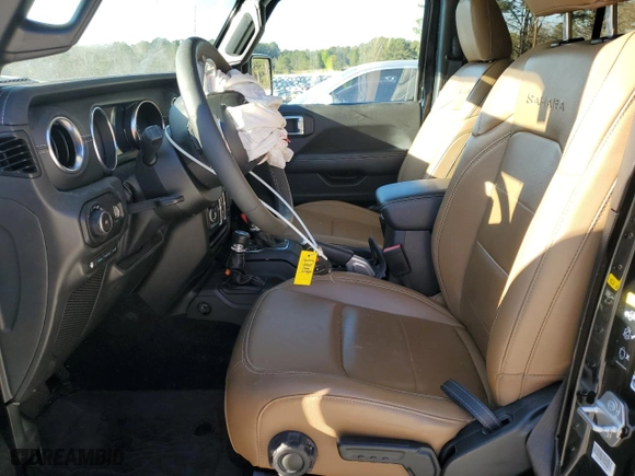 2023 Jeep Wrangler 4xe Sahara with VIN 1C4JJXP65PW585394, listed as a Copart auction lot 85741584 with 27,125 mi miles and Salvage Title. Bid and sale history available at carsss.com. Image 7.