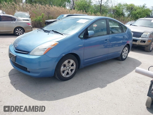 2009 Toyota Prius with VIN JTDKB20U397838867, listed as a IAAI auction lot 42105743 with 184,529 mi miles. Bid and sale history available at carsss.com. Image 2.