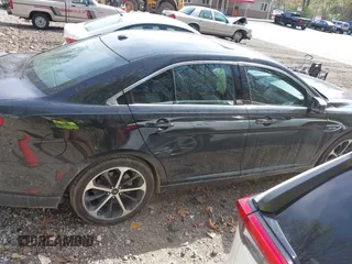 2014 Ford Taurus SHO with VIN 1FAHP2KT8EG131067, listed as a IAAI auction lot 42102086 with 107,822 mi miles. Bid and sale history available at carsss.com. Image 13.
