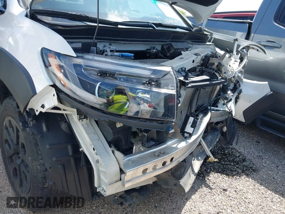 2023 Honda Ridgeline Black Edition with VIN 5FPYK3F84PB011792, listed as a IAAI auction lot 42049593 with 21,002 mi miles and . Bid and sale history available at DreamBid. Image 22.