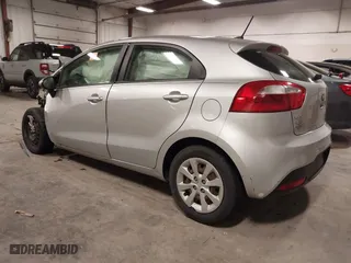 2013 Kia Rio LX with VIN KNADM5A31D6274318, listed as a IAAI auction lot 40986091 with 182,000 mi miles. Bid and sale history available at carsss.com. Image 3.