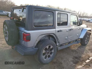 2018 Jeep Wrangler Unlimited Sahara z VIN 1C4HJXEN4JW173435, wystawiony jako IAAI lot #41453040 z przebiegiem 51 530 mil mil oraz . Historia ofert i sprzedaży dostępna na DreamBid. Obrazek 18.