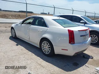2010 Cadillac CTS Luxury z VIN 1G6DE5EG8A0106576, wystawiony jako IAAI lot #42256108 z przebiegiem 86 740 mil mil oraz . Historia ofert i sprzedaży dostępna na DreamBid. Obrazek 3.