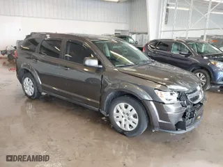 2014 Dodge Journey SE with VIN 3C4PDCAB8ET173196, listed as a IAAI auction lot 41619725 with 149,550 mi miles. Bid and sale history available at carsss.com. Image 1.