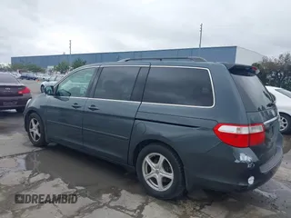 2005 Honda Odyssey TOURING with VIN 5FNRL38895B061480, listed as a IAAI auction lot 41807150 with 190,261 mi miles. Bid and sale history available at carsss.com. Image 3.