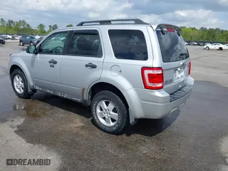 2011 Ford Escape XLT with VIN 1FMCU9D73BKB26014, listed as a IAAI auction lot 41954987 with 156,433 mi miles. Bid and sale history available at carsss.com. Image 3.