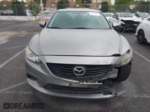 2014 Mazda 6 i Touring with VIN JM1GJ1V60E1141831, listed as a IAAI auction lot 42131200 with 86,597 mi miles and . Bid and sale history available at DreamBid. Image 12.