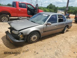 1993 Honda Accord with VIN 1HGCB7656PA061216, listed as a Copart auction lot 57773815 with 272,136 mi miles and Salvage title. Bid and sale history available at DreamBid. Image 1.