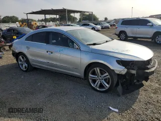 2015 Volkswagen CC R-Line with VIN WVWBN7AN4FE805069, listed as a Copart auction lot 72656024 with 61,898 mi miles and Salvage Title. Bid and sale history available at DreamBid. Image 4.