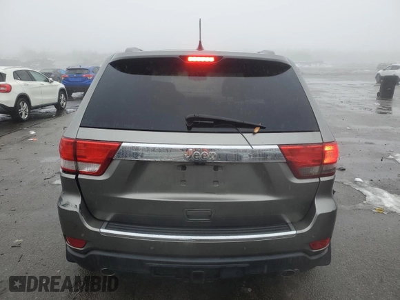 2013 Jeep Grand Cherokee Overland with VIN 1C4RJFCTXDC555233, listed as a Copart auction lot 44535045 with 104,721 mi miles and Clean Title. Bid and sale history available at carsss.com. Image 6.