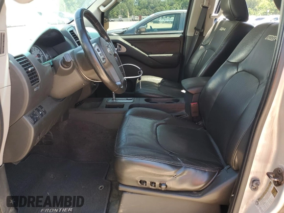 2014 Nissan Frontier SV z VIN 1N6AD0EV9EN738982, wystawiony jako Copart lot #61353985 z przebiegiem 205 593 mil mil oraz Szkoda całkowita • Salvage title. Historia ofert i sprzedaży dostępna na DreamBid. Obrazek 7.