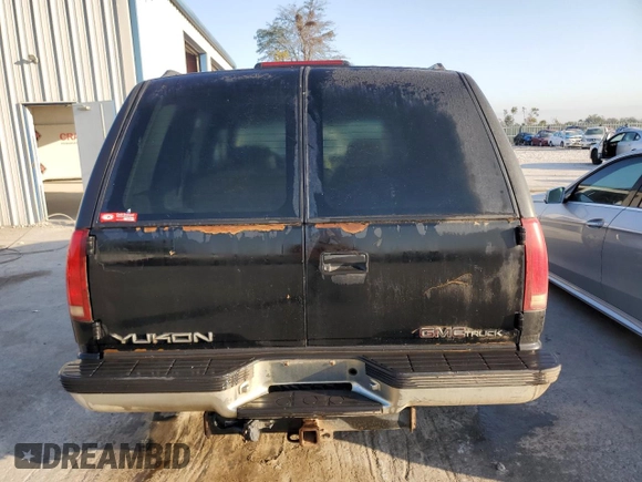 1997 GMC Yukon with VIN 1GKEK13R4VJ752757, listed as a Copart auction lot 75574214 with 251,193 mi miles and Clean Title. Bid and sale history available at carsss.com. Image 6.
