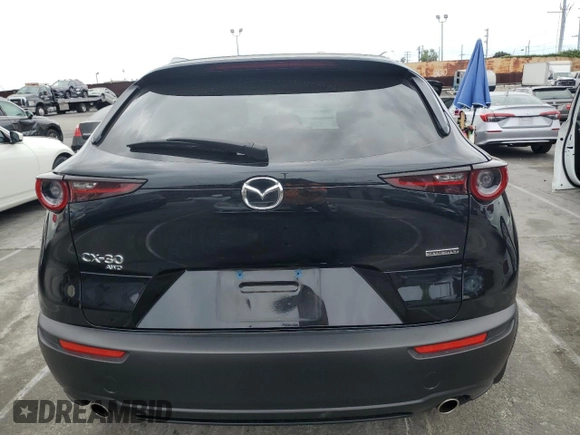 2024 Mazda CX-30 S Carbon Edition z VIN 3MVDMBCM1RM618954, wystawiony jako Copart lot #53690825 z przebiegiem 16 776 mil mil oraz Szkoda całkowita • Salvage title. Historia ofert i sprzedaży dostępna na DreamBid. Obrazek 6.