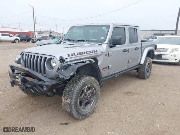 2021 Jeep Gladiator Rubicon with VIN 1C6JJTBG1ML525920, listed as a IAAI auction lot 41548657 with 22,574 mi miles. Bid and sale history available at carsss.com. Image 2.