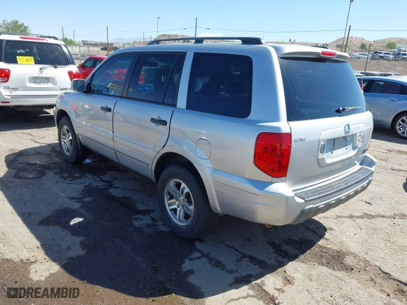 2004 Honda Pilot EX with VIN 2HKYF18674H581196, listed as a IAAI auction lot 42043003 with 220,102 mi miles. Bid and sale history available at carsss.com. Image 3.