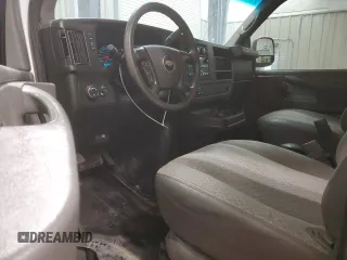 2014 Chevrolet Express Passenger LT with VIN 1GAZG1FG4E1176590, listed as a Copart auction lot 83660024 with 167,653 mi miles and Salvage title. Bid and sale history available at DreamBid. Image 8.