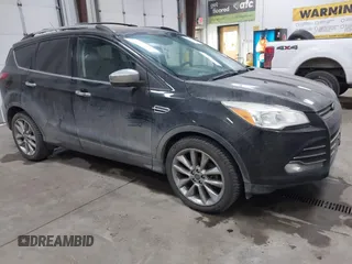 2014 Ford Escape SE with VIN 1FMCU9GXXEUD09124, listed as a IAAI auction lot 41747925 with 147,996 mi miles and . Bid and sale history available at DreamBid. Image 1.