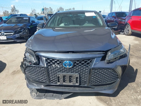 2019 Toyota Avalon Hybrid Limited with VIN 4T1B21FB9KU004539, listed as a IAAI auction lot 41784328 with 99,811 mi miles. Bid and sale history available at carsss.com. Image 12.