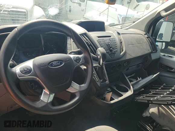 2018 Ford Transit with VIN 1FTYR1YG5JKA87528, listed as a IAAI auction lot 42731354 with 169,818 mi miles and . Bid and sale history available at DreamBid. Image 7.