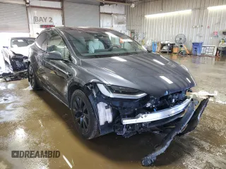 2023 Tesla Model X Plaid with VIN 7SAXCBE6XPF373589, listed as a Copart auction lot 50355615 with 11,650 mi miles and Salvage Title. Bid and sale history available at DreamBid. Image 4.
