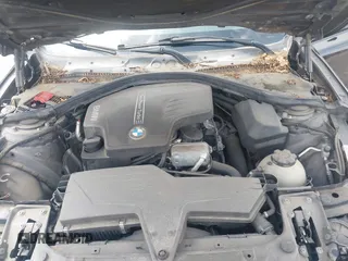 2014 BMW 3 Series 328i xDrive with VIN WBA3B3C56EJ981322, listed as a IAAI auction lot 42104530 with 104,376 mi miles. Bid and sale history available at carsss.com. Image 10.