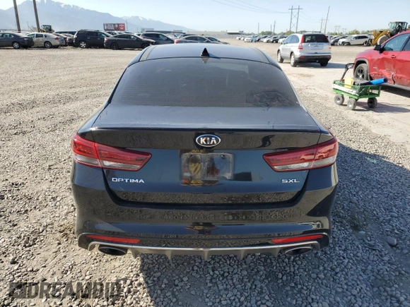 2018 Kia Optima SX with VIN 5XXGV4L26JG206377, listed as a Copart auction lot 58848385 with Not provided miles and Salvage title. Bid and sale history available at DreamBid. Image 6.