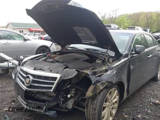 2013 Cadillac ATS Premium AWD z VIN 1G6AL5S36D0111869, wystawiony jako IAAI lot #42199637 z przebiegiem 148 404 mil mil oraz . Historia ofert i sprzedaży dostępna na DreamBid. Obrazek 6.