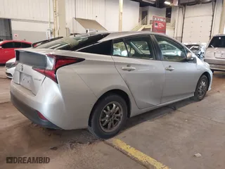 2020 Toyota Prius L Eco with VIN JTDKARFU9L3104185, listed as a IAAI auction lot 41278803 with 108,686 mi miles. Bid and sale history available at carsss.com. Image 4.