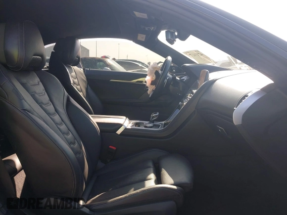 2022 BMW 8 Series with VIN WBAFY4C04NCJ78602, listed as a IAAI auction lot 42034279 with 11,757 mi miles and . Bid and sale history available at DreamBid. Image 5.