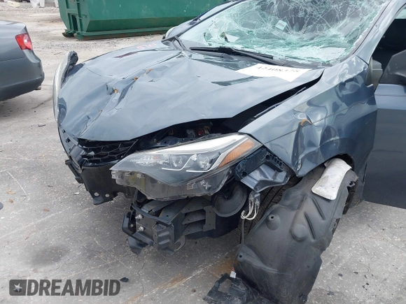 2018 Toyota Corolla L with VIN 5YFBURHE1JP814781, listed as a IAAI auction lot 42408378 with 115,543 mi miles and . Bid and sale history available at DreamBid. Image 18.