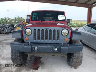 2012 Jeep Wrangler Unlimited Sport z VIN 1C4BJWDG3CL207291, wystawiony jako IAAI lot #42211454 z przebiegiem 110 864 mil mil oraz . Historia ofert i sprzedaży dostępna na DreamBid. Obrazek 13.