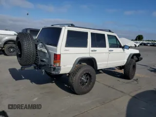 1996 Jeep Cherokee SE z VIN 1J4FJ28S7TL270218, wystawiony jako Copart lot #55302885 z przebiegiem 239 209 mil mil oraz Szkoda całkowita • Salvage title. Historia ofert i sprzedaży dostępna na DreamBid. Obrazek 3.