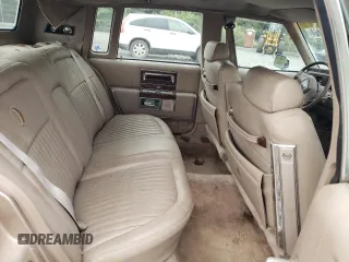 1992 Cadillac Brougham z VIN 1G6DW5479NR710170, wystawiony jako Copart lot #70194164 z przebiegiem Nie podano mil oraz Nie do naprawy. Historia ofert i sprzedaży dostępna na DreamBid. Obrazek 10.