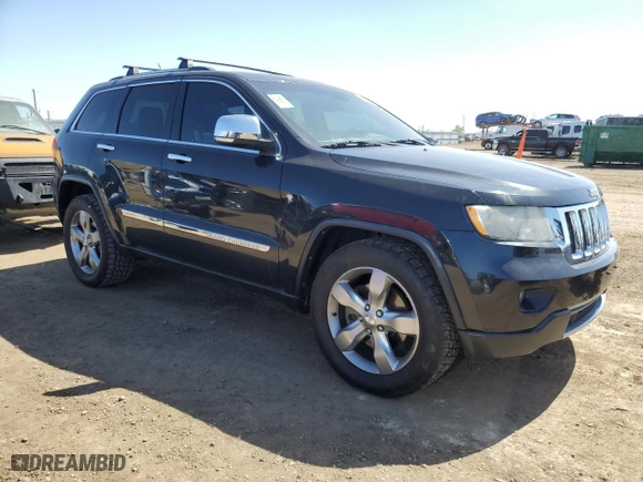 2011 Jeep Grand Cherokee Overland with VIN 1J4RR6GT4BC541497, listed as a Copart auction lot 52121595 with 143,010 mi miles and Clean Title. Bid and sale history available at carsss.com. Image 4.