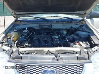 2004 Ford Escape Limited with VIN 1FMCU04174KA97935, listed as a IAAI auction lot 42314791 with 143,900 mi miles and . Bid and sale history available at DreamBid. Image 10.