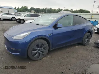 2024 Tesla Model Y Long Range with VIN 7SAYGDEE0RA321450, listed as a Copart auction lot 62895085 with 8,303 mi miles and Salvage title. Bid and sale history available at DreamBid. Image 1.