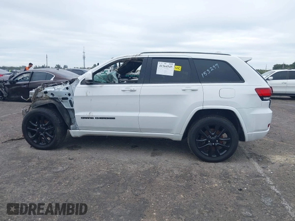 2018 Jeep Grand Cherokee Laredo E with VIN 1C4RJEAG4JC153297, listed as a IAAI auction lot 41364545 with Not provided miles and . Bid and sale history available at DreamBid. Image 14.
