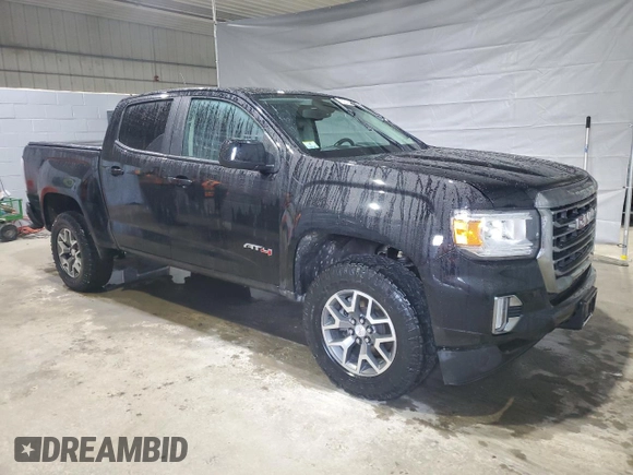 2021 GMC Canyon 4WD AT4 w/Leather with VIN 1GTG6FEN8M1255144, listed as a Copart auction lot 50186815 with 43,610 mi miles and Salvage Title. Bid and sale history available at carsss.com. Image 4.