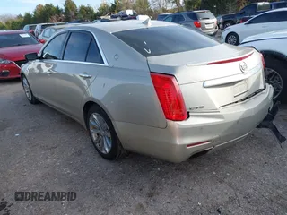 2014 Cadillac CTS Luxury RWD with VIN 1G6AR5SX5E0178417, listed as a IAAI auction lot 40956981 with 117,532 mi miles. Bid and sale history available at carsss.com. Image 3.
