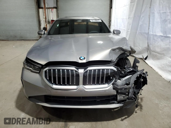 2024 BMW 5 Series 530i xDrive with VIN WBA53FJ06RCS08858, listed as a Copart auction lot 73521784 with 4,823 mi miles and Clean Title. Bid and sale history available at carsss.com. Image 5.