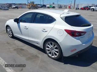 2015 Mazda 3 S Grand Touring with VIN JM1BM1M39F1233093, listed as a IAAI auction lot 42245609 with 137,487 mi miles and . Bid and sale history available at DreamBid. Image 3.
