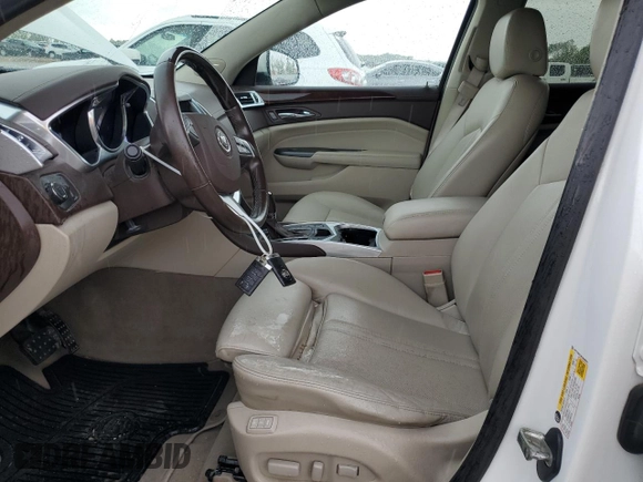2012 Cadillac SRX Luxury Collection z VIN 3GYFNAE34CS648291, wystawiony jako Copart lot #55090415 z przebiegiem 103 286 mil mil oraz Szkoda całkowita • Salvage title. Historia ofert i sprzedaży dostępna na DreamBid. Obrazek 7.