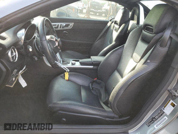 2014 Mercedes-Benz SLK 250 with VIN WDDPK4HA0EF091357, listed as a Copart auction lot 82316804 with 71,993 mi miles and Salvage title. Bid and sale history available at DreamBid. Image 7.