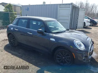 2016 MINI Cooper Hardtop 4 Door S with VIN WMWXU3C56G2D27528, listed as a IAAI auction lot 41827277 with 61,545 mi miles. Bid and sale history available at carsss.com. Image 1.